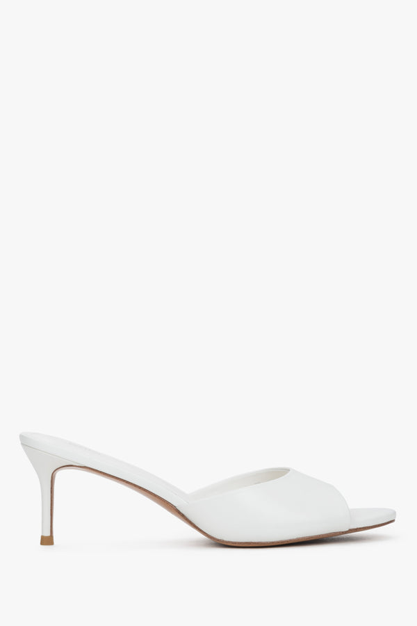 Side view of women's white leather heeled mules by Estro