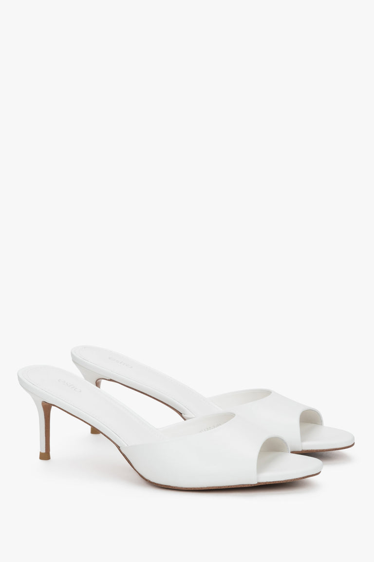 Women's white leather mules with open toe and slim stiletto heel