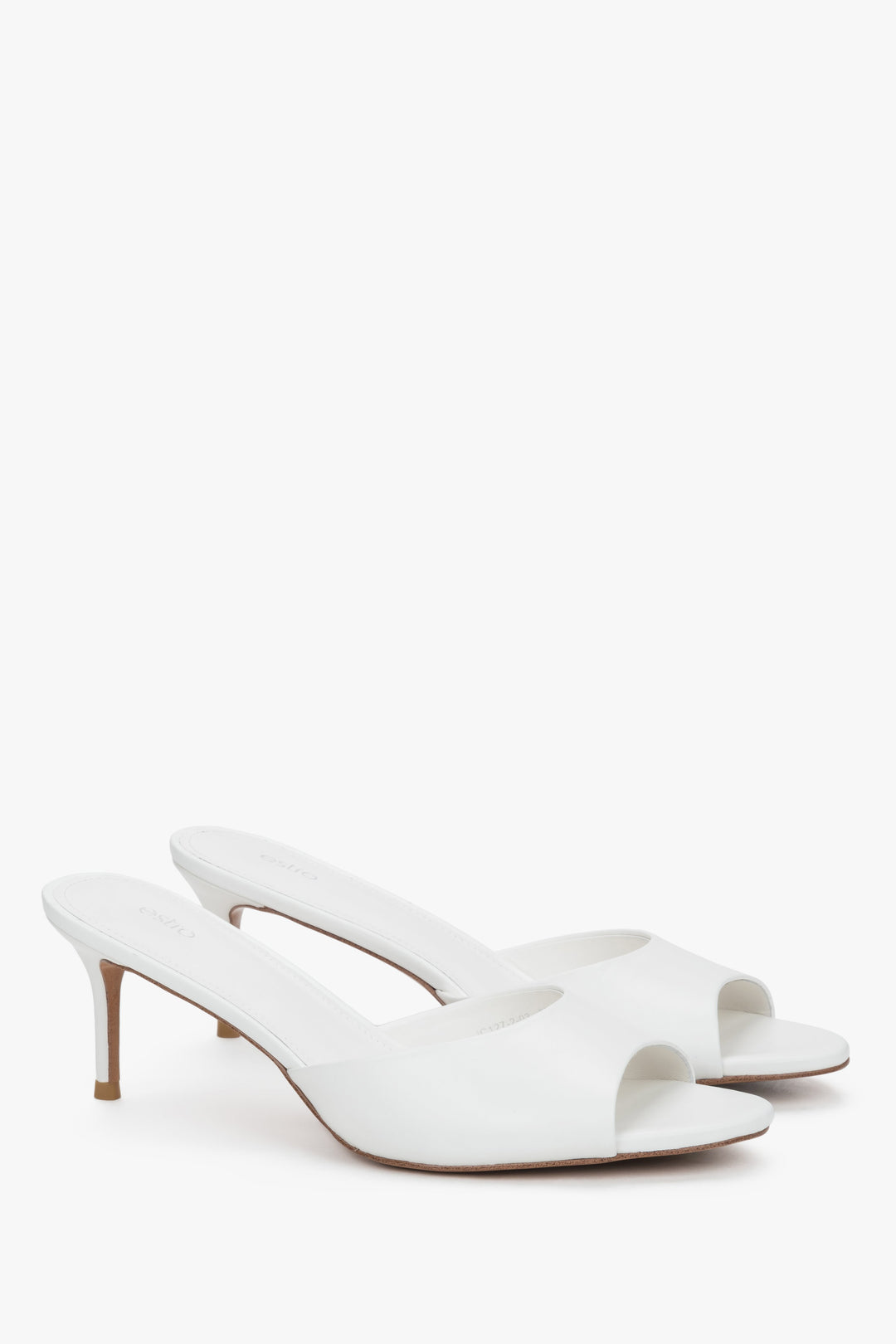 Women's white leather mules with open toe and slim stiletto heel