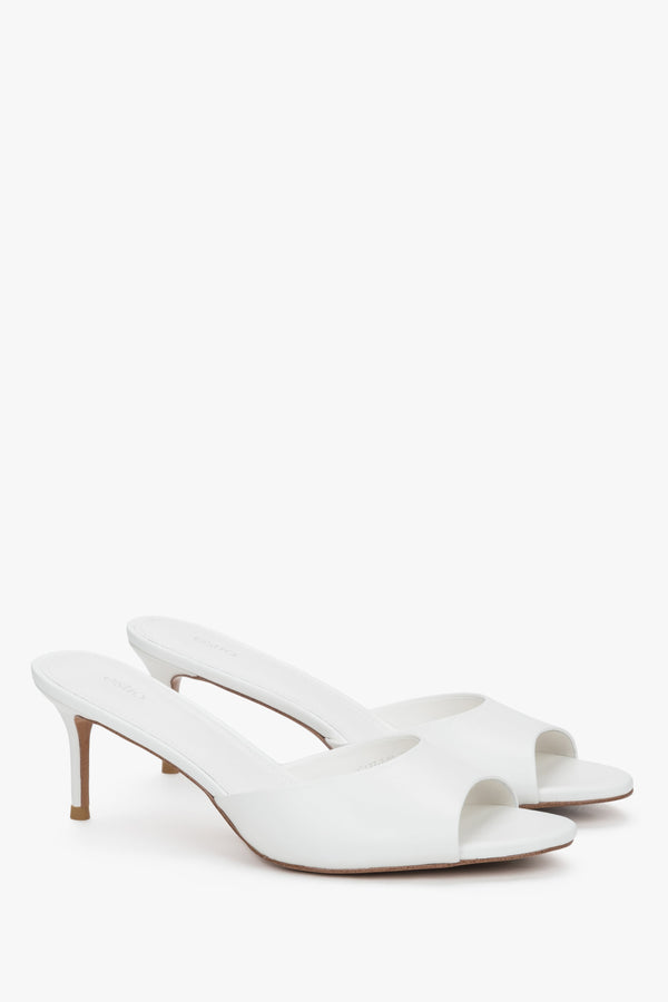 Women's white leather mules with open toe and slim stiletto heel
