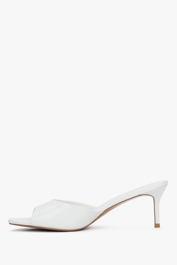 Low side view of women's white leather heeled mules by Estro