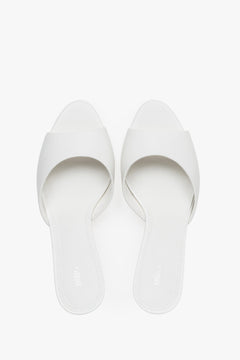 Top view of women's white leather heeled mules by Estro