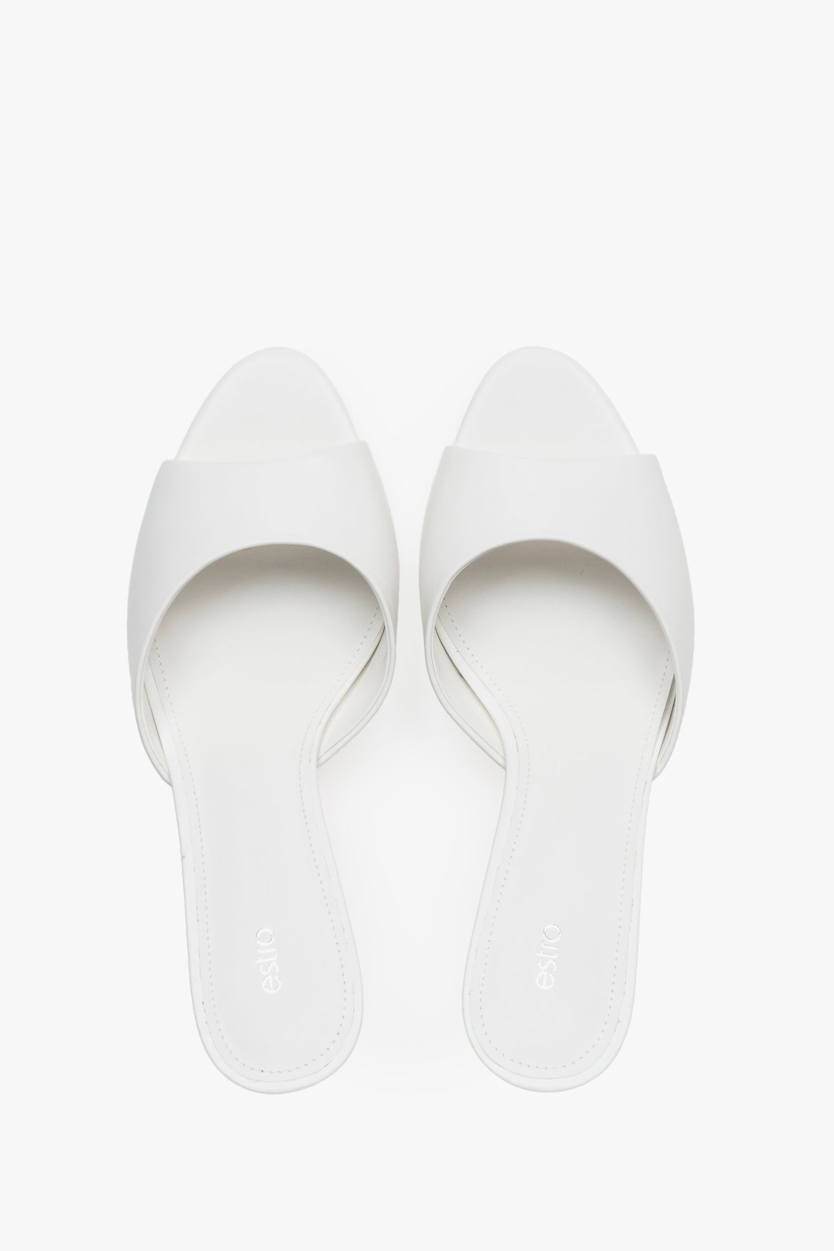 Top view of women's white leather heeled mules by Estro