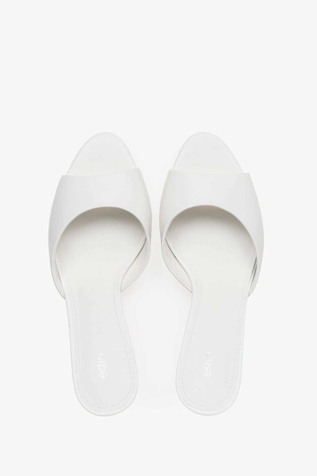 Top view of women's white leather heeled mules by Estro