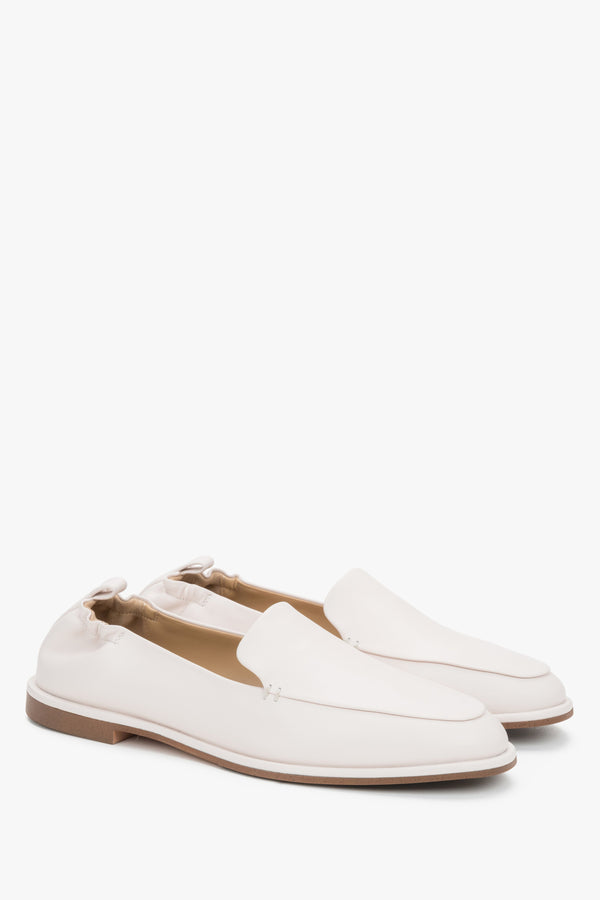 Women's white leather loafers with flat rubber sole