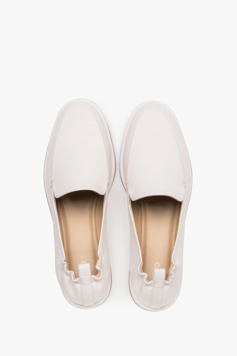 Top view of women's white leather loafers by Estro