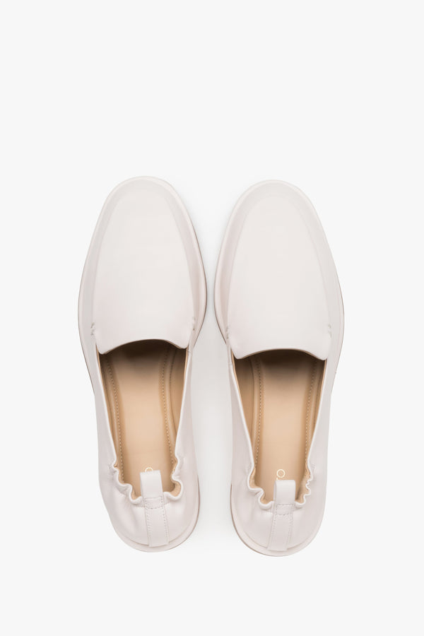 Top view of women's white leather loafers by Estro