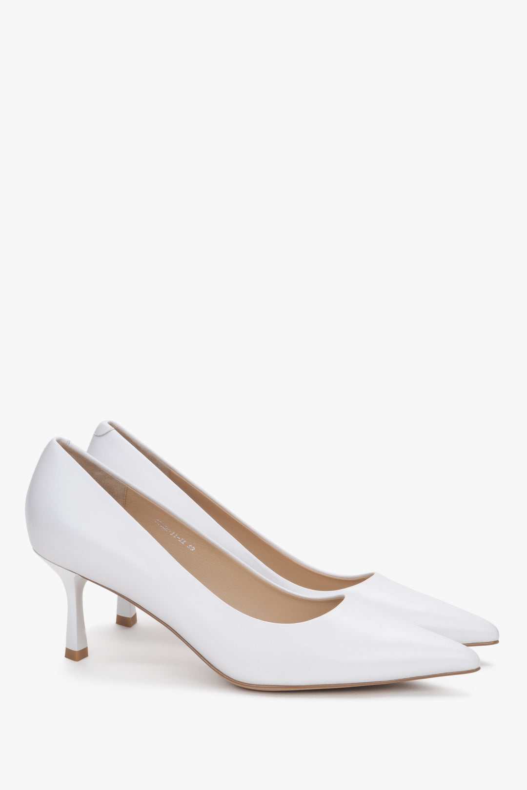 White leather pointed-toe shoes with low heels.