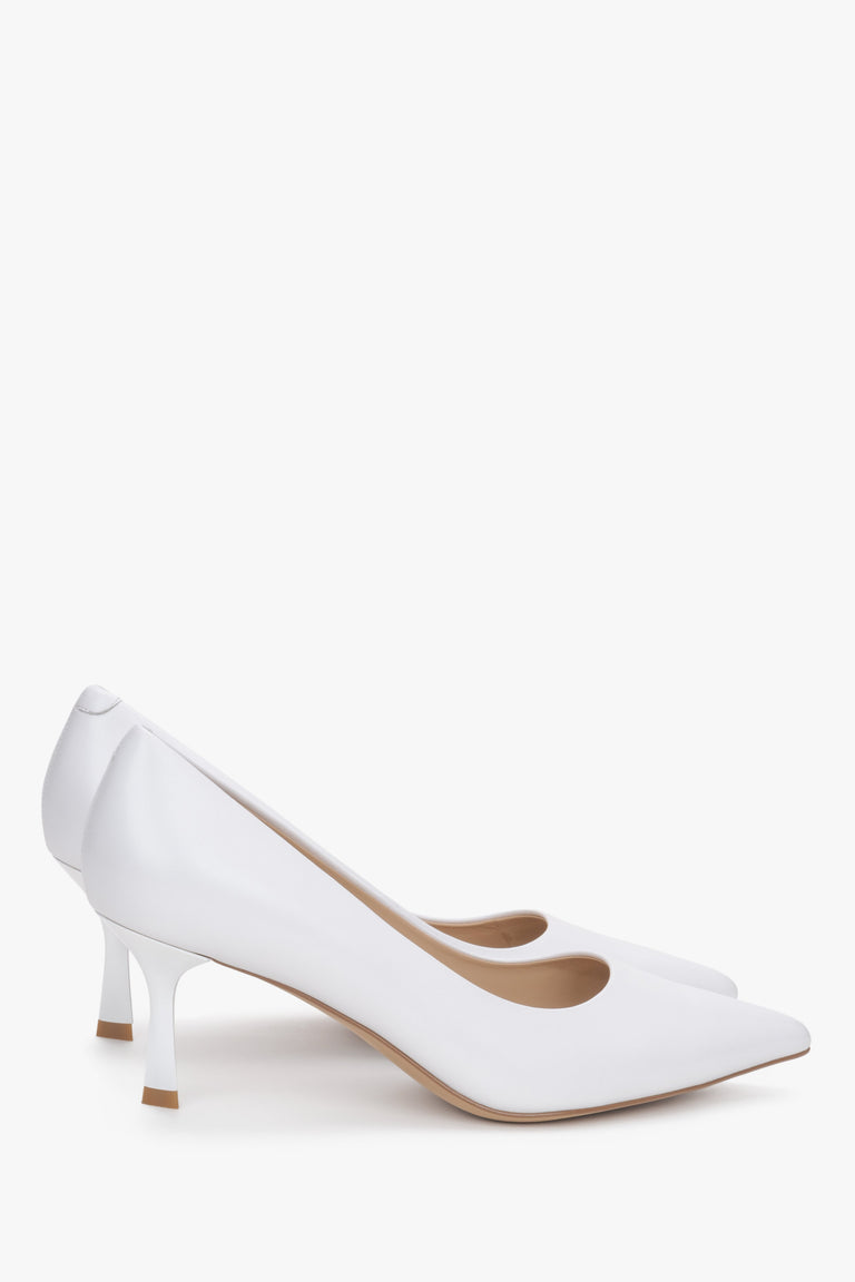 White pointed-toe stilettos by Estro - a side profile.