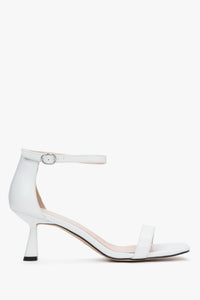 Elegant white sandals for women from Estro, crafted from genuine leather, and set upon a stylishly sturdy funnel heel.
