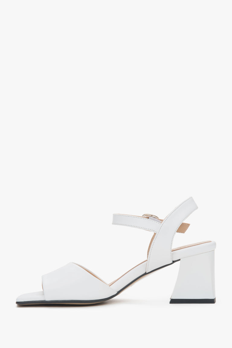 White women’s Estro leather block-heel sandals with an adjustable buckle.