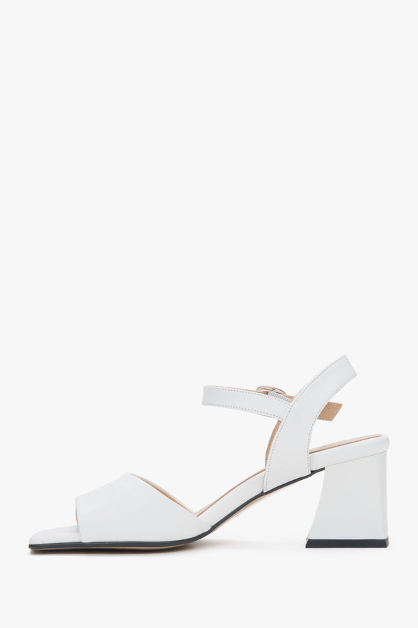 White women’s Estro leather block-heel sandals with an adjustable buckle.