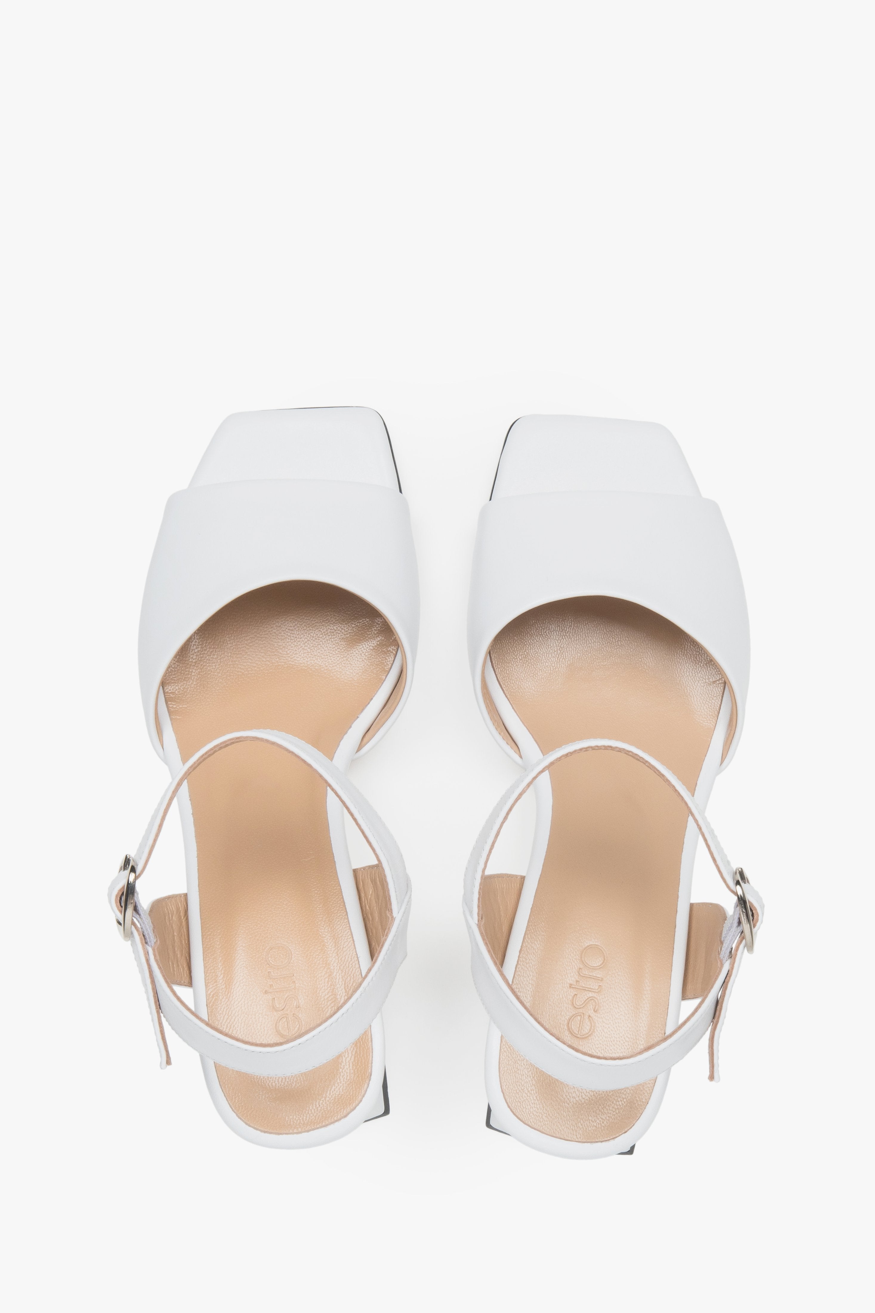 Women’s white Estro leather block-heel sandals with an adjustable buckle.