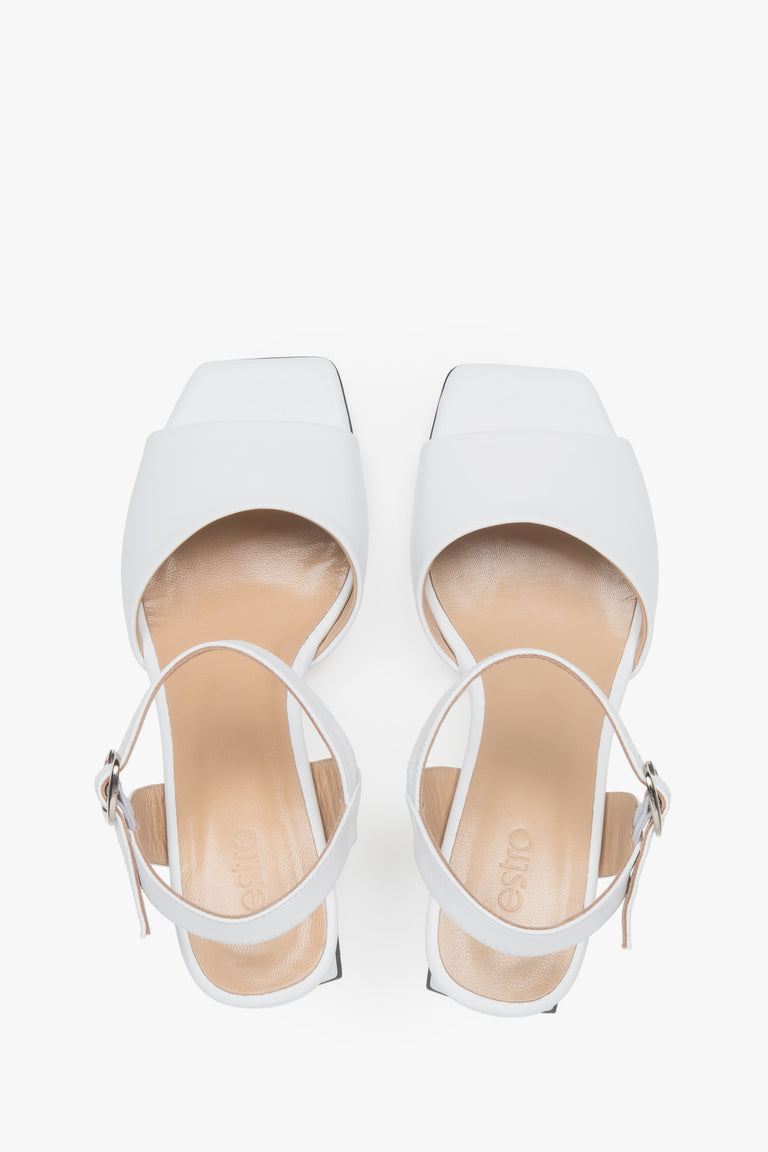 Women’s white Estro leather block-heel sandals with an adjustable buckle.