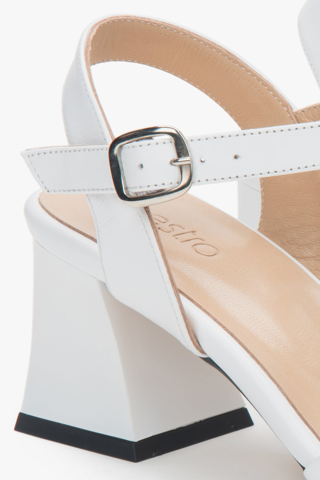 White women’s Estro leather block-heel sandals with an adjustable buckle.