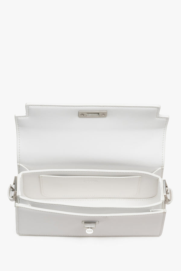 Interior view of women's white leather shoulder bag by Estro