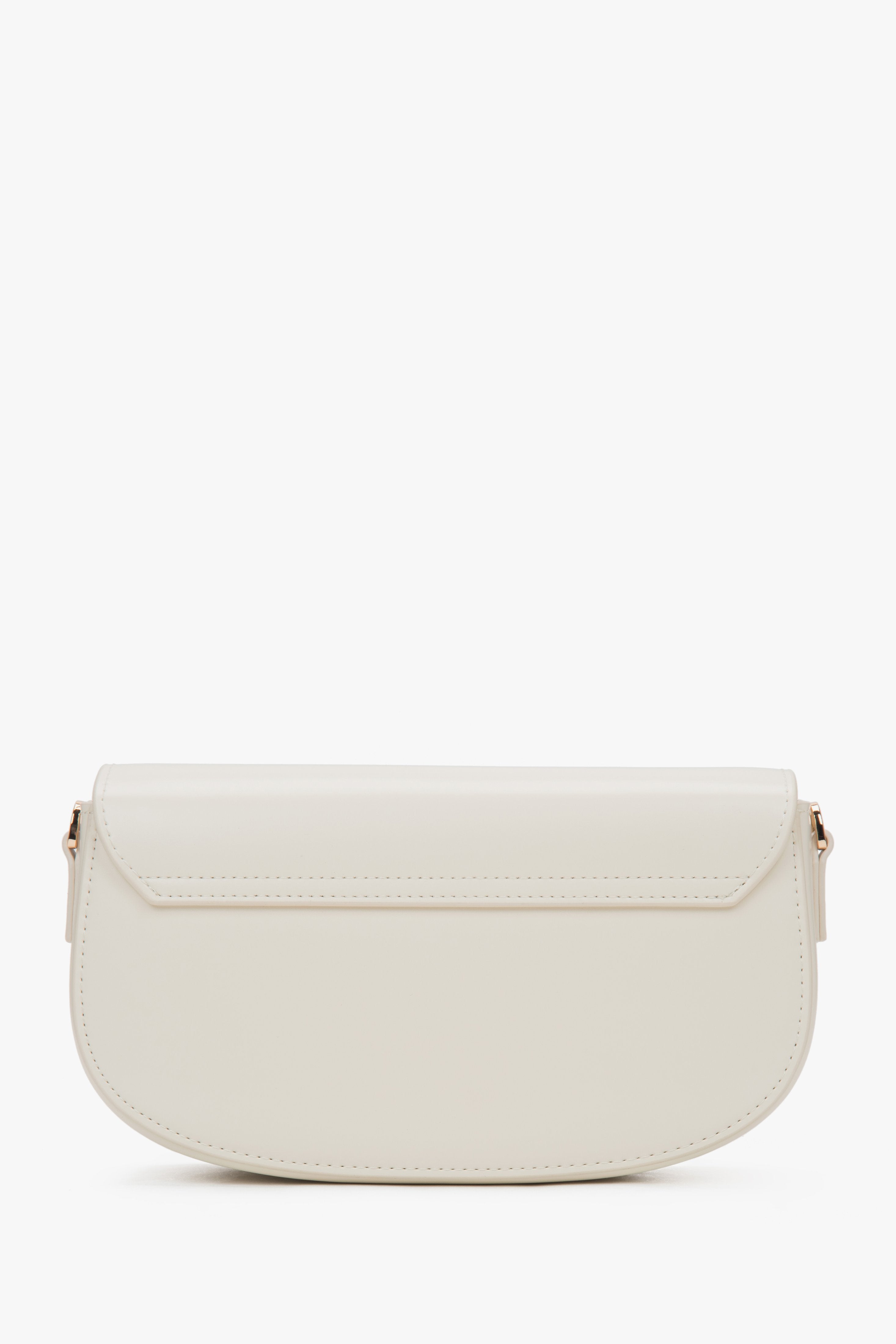 White women's saddle shoulder bag made of genuine leather.