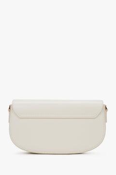 White women's saddle shoulder bag made of genuine leather.