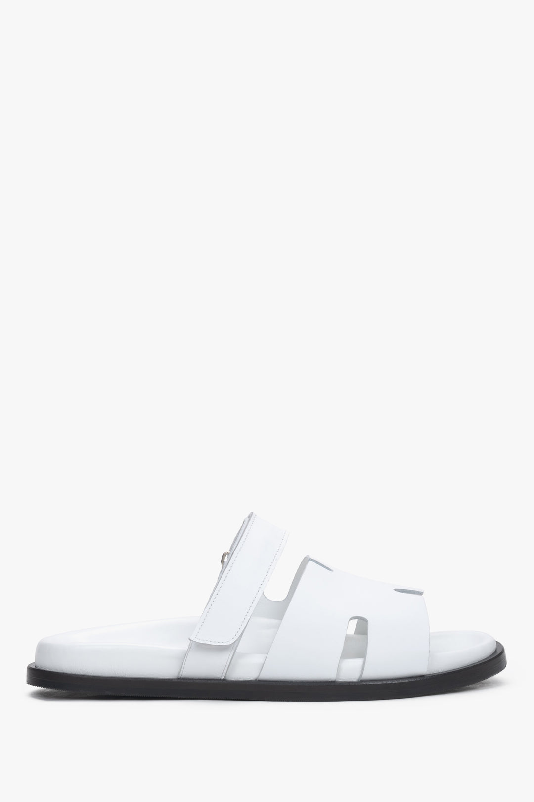 White leather women’s slides with an adjustable strap – side view.