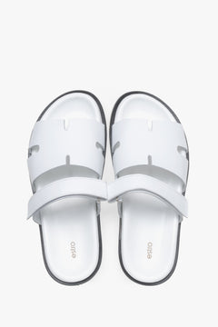 Women’s white leather slides with an adjustable strap, Estro – top view.