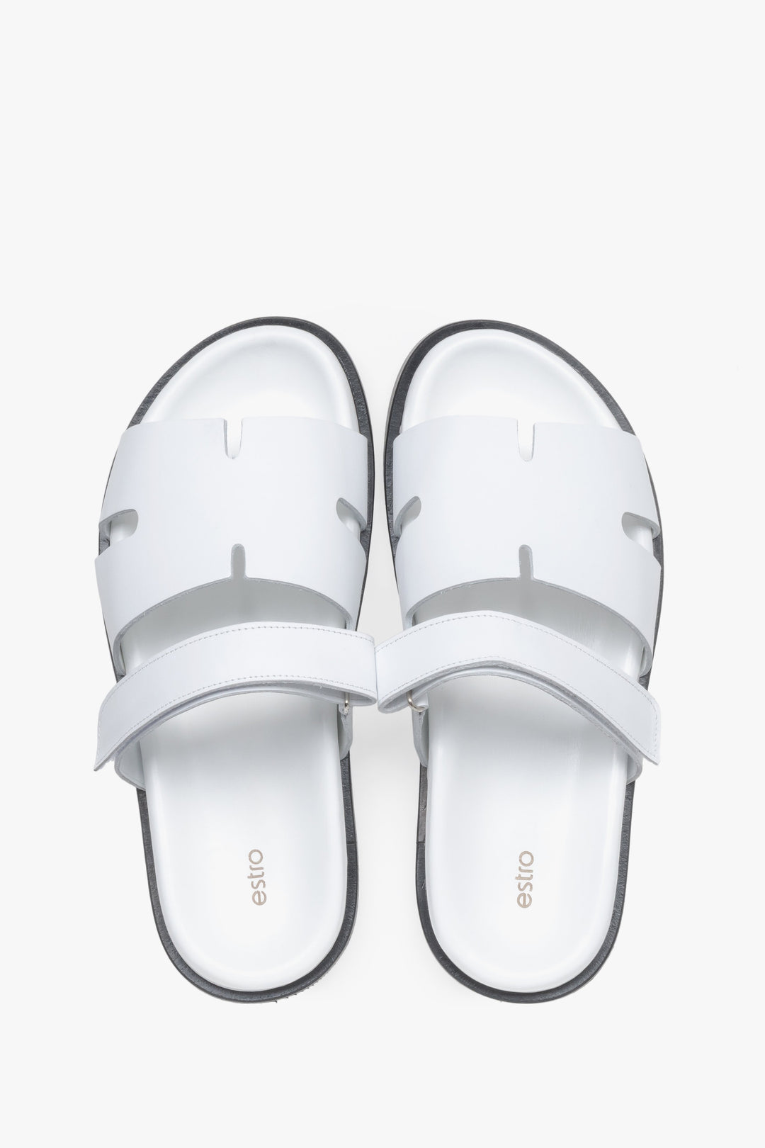 Women’s white leather slides with an adjustable strap, Estro – top view.