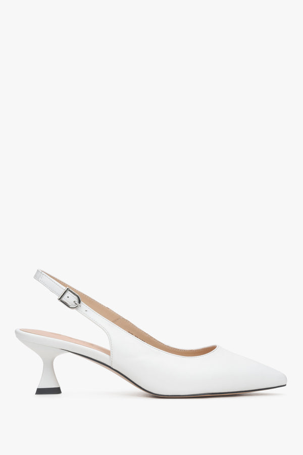 Women’s white leather slingback pumps with a low flared heel.