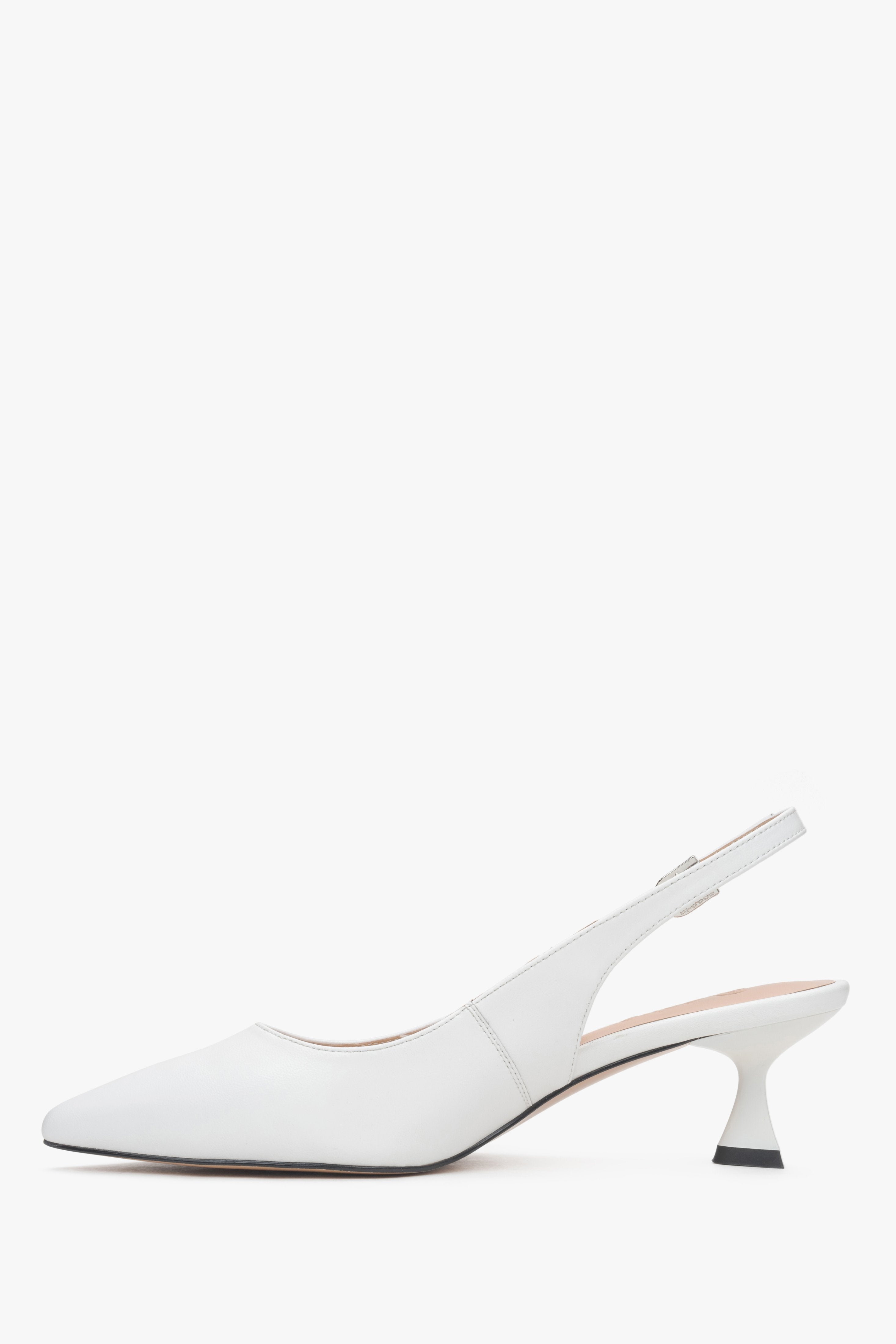 Women’s white leather slingback pumps with a low flared heel by Estro.