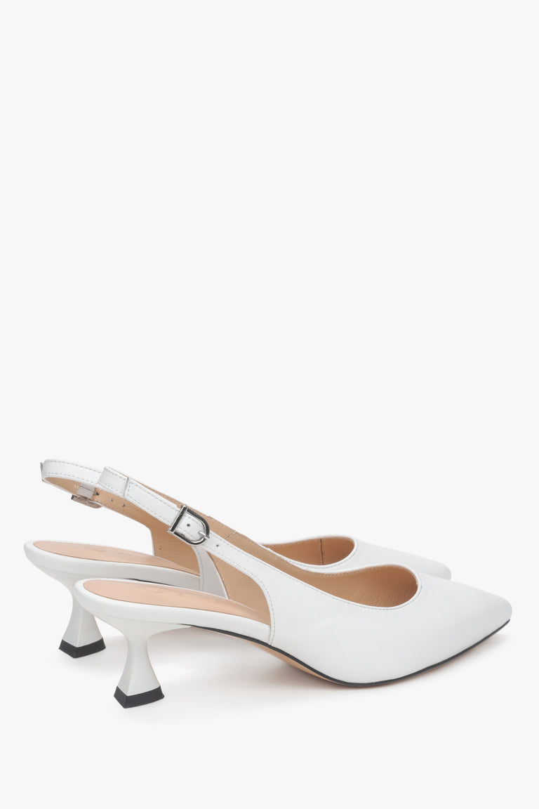 Slingback design, white leather women’s pumps with a low flared heel by Estro.