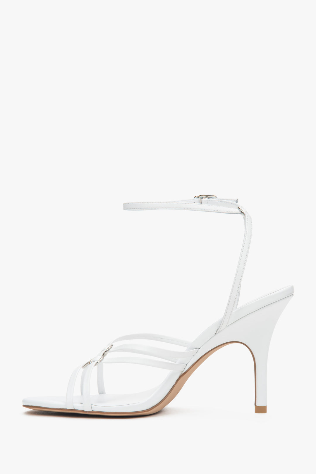 Women’s white leather stiletto sandals with silver details by Estro.
