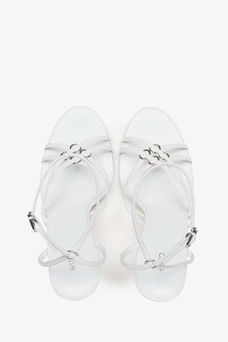 Women’s white leather stiletto sandals with silver details by Estro.