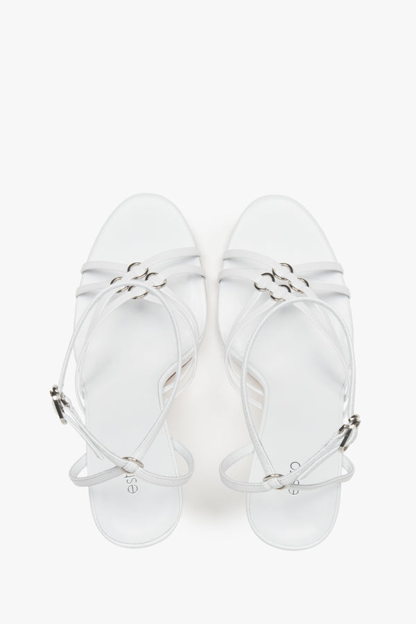 Women’s white leather stiletto sandals with silver details by Estro.