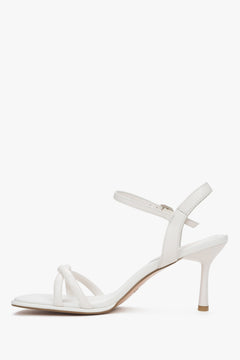 Estro white women’s leather stiletto sandals with thin straps.