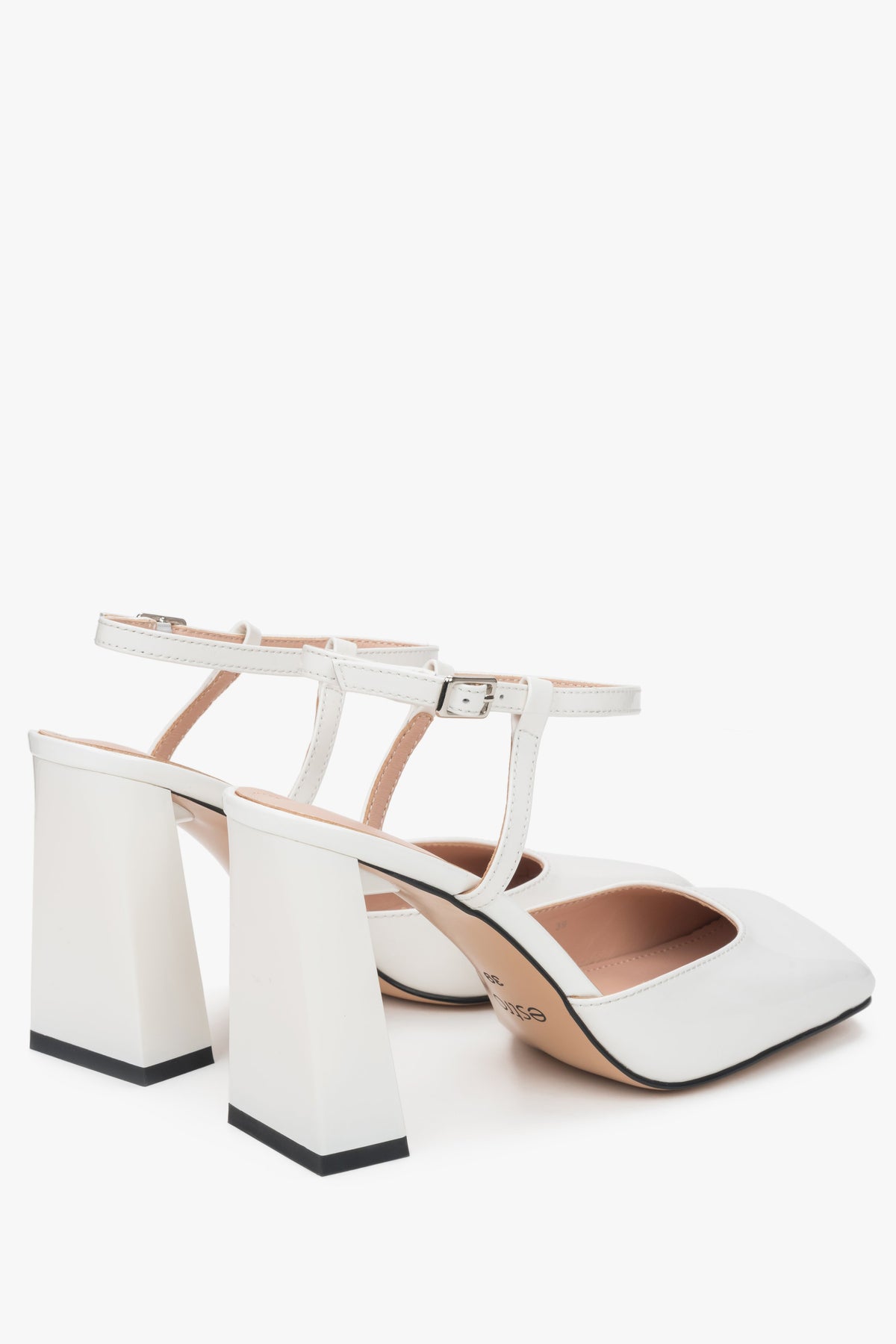 Women’s white block heel sandals in patent leather by Estro – heel view.