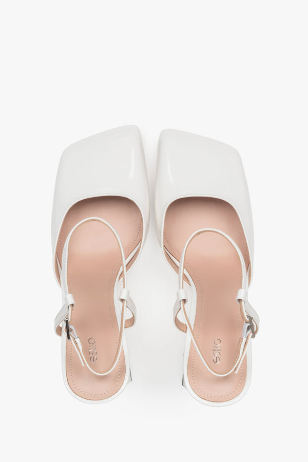 Women’s white block heel sandals in patent leather by Estro – top view.