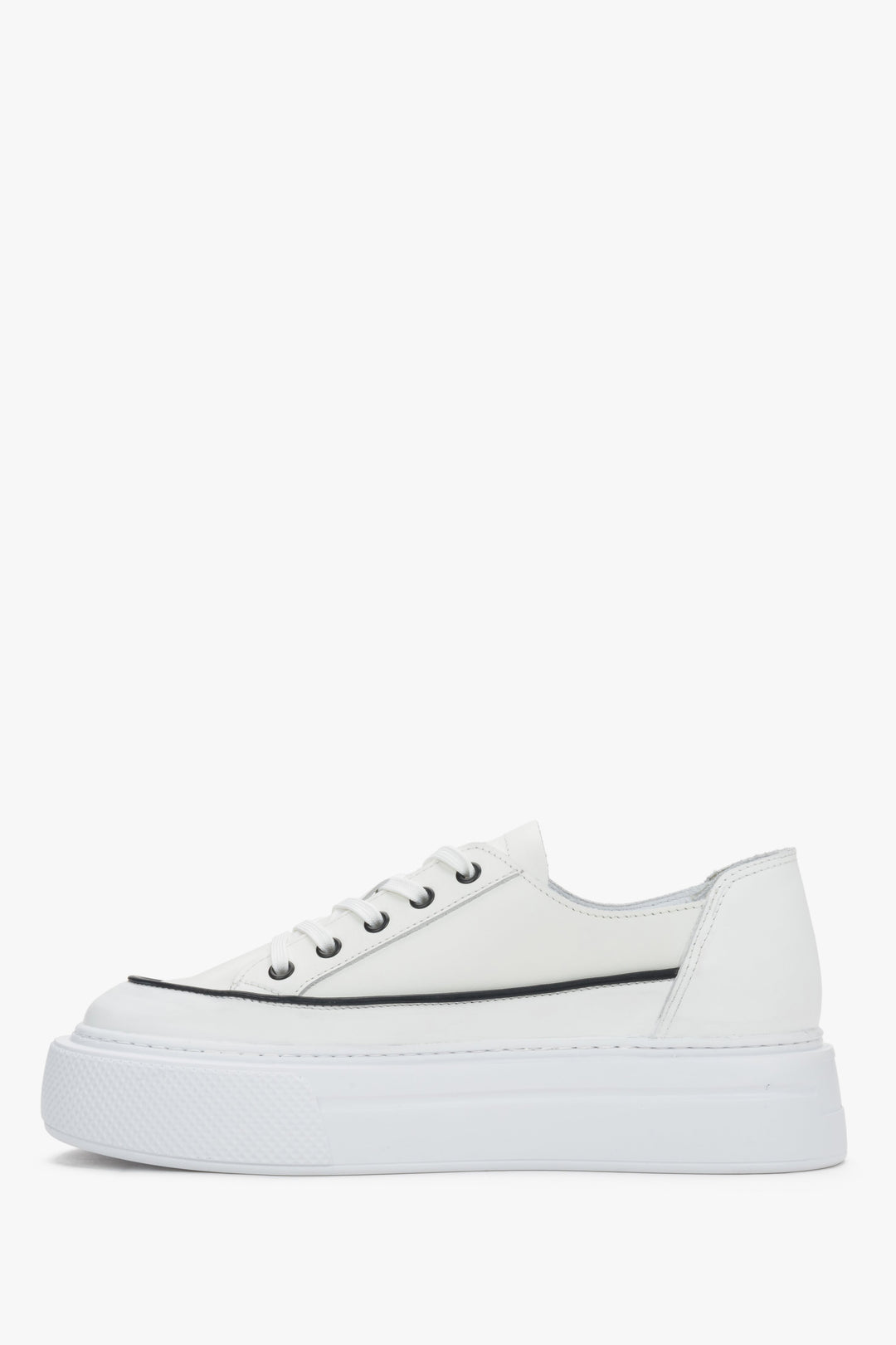 Side view of women’s white leather platform sneakers with lace-up fastening.