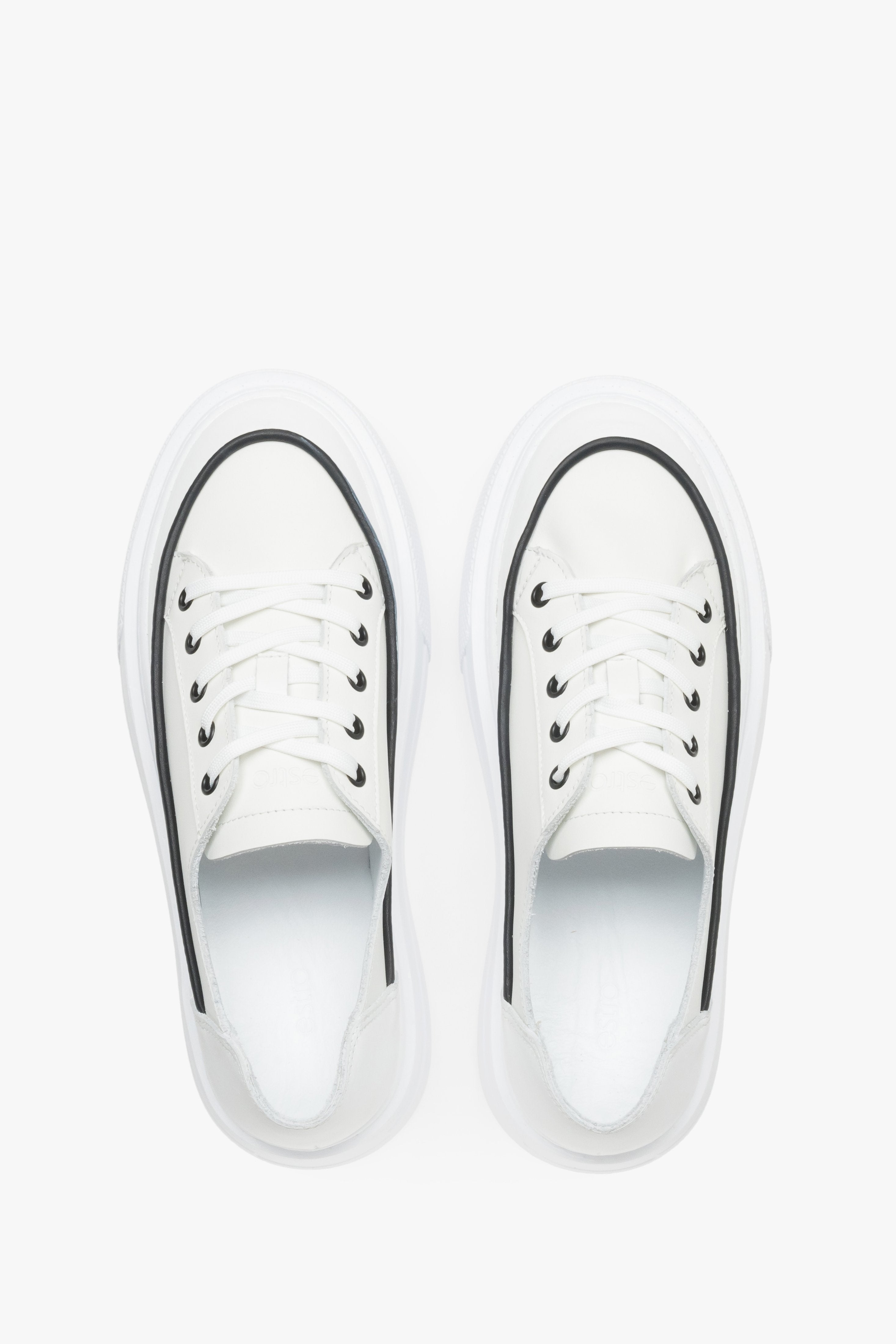 Top view of women’s white platform sneakers made from Italian premium leather.