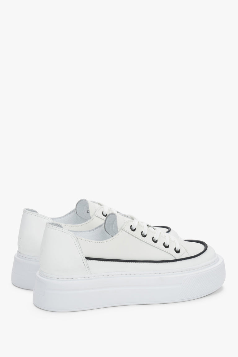 Women’s white sneakers with PU platform sole and black details.