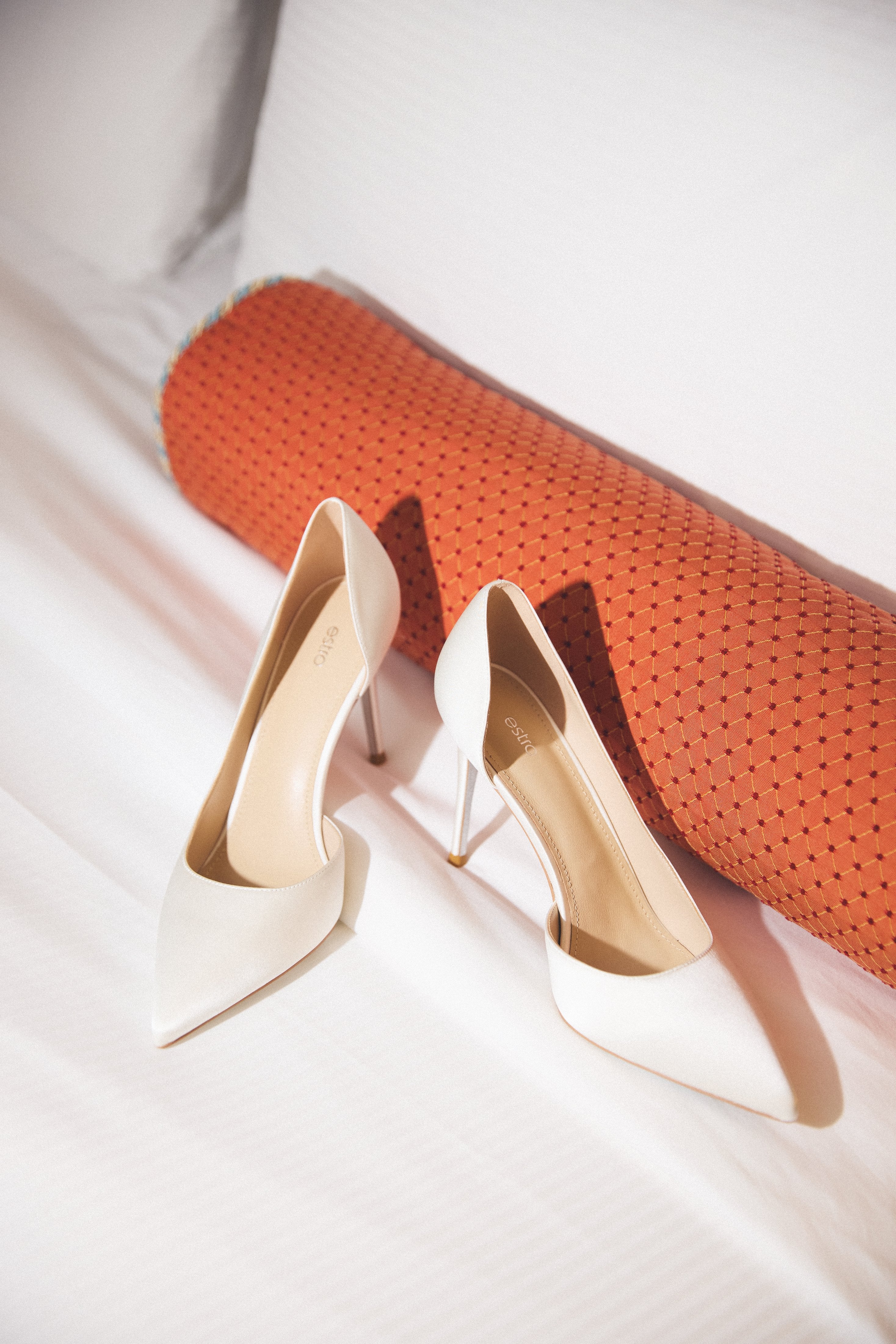 White women’s stiletto heels by Estro.