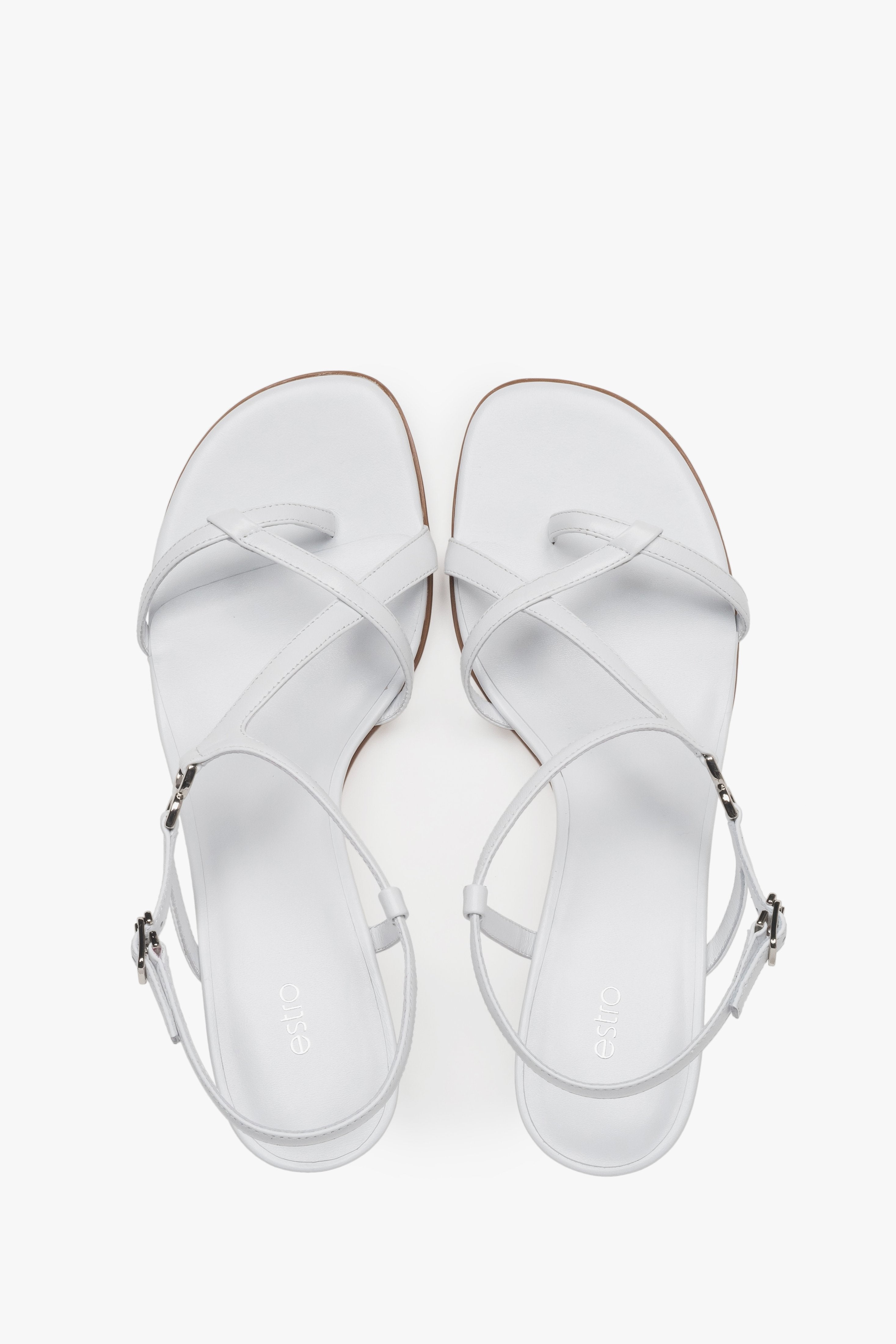 With a funnel heel, white women’s sandals with woven straps Estro.