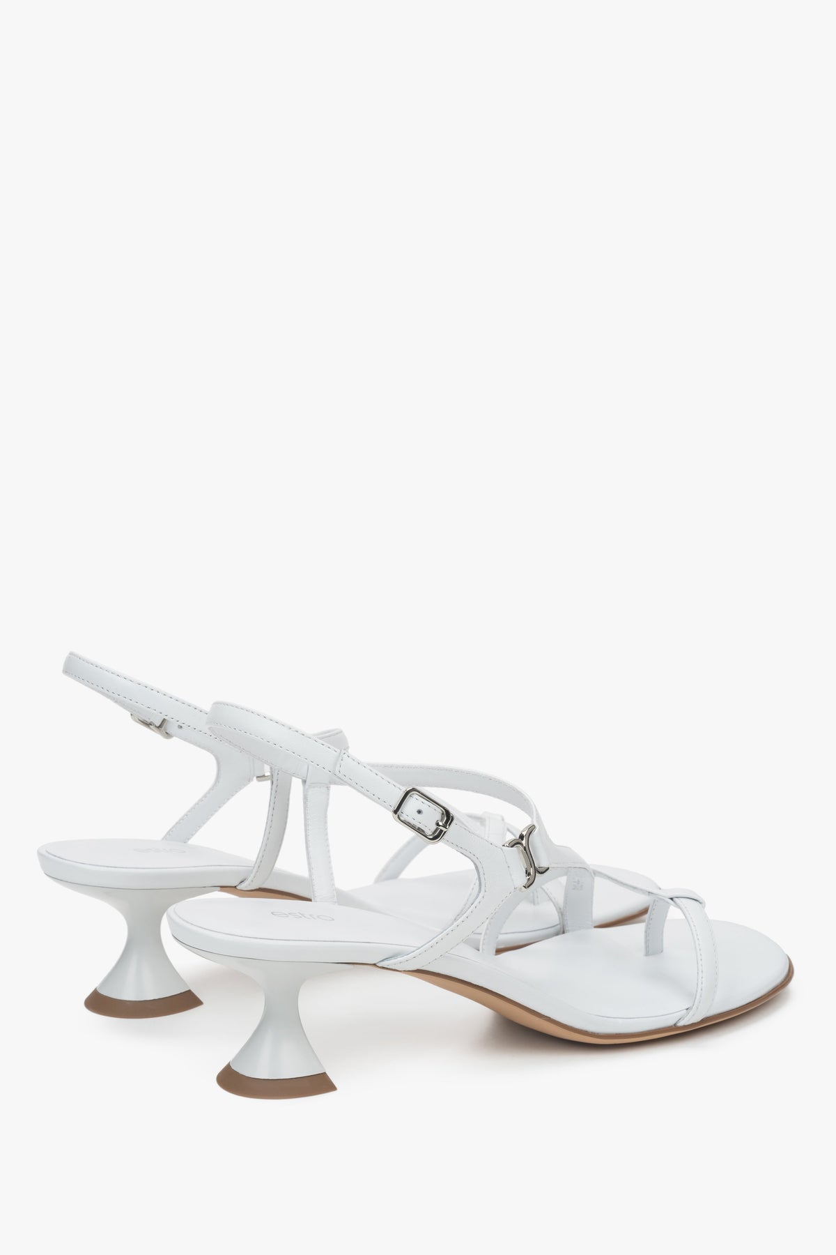 Made of woven straps, white women’s sandals with a funnel heel Estro.