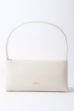 White women's shoulder bag made of leather.