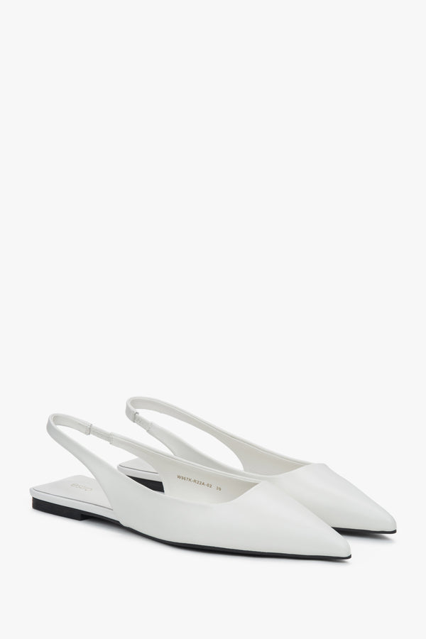 Women's white slingback sandals with a pointed toe and flat heel.