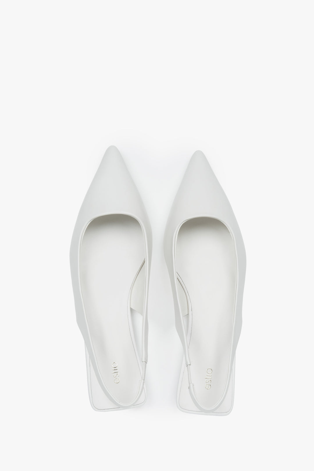 Elegant women's white slingback sandals with a pointed toe and flat heel.