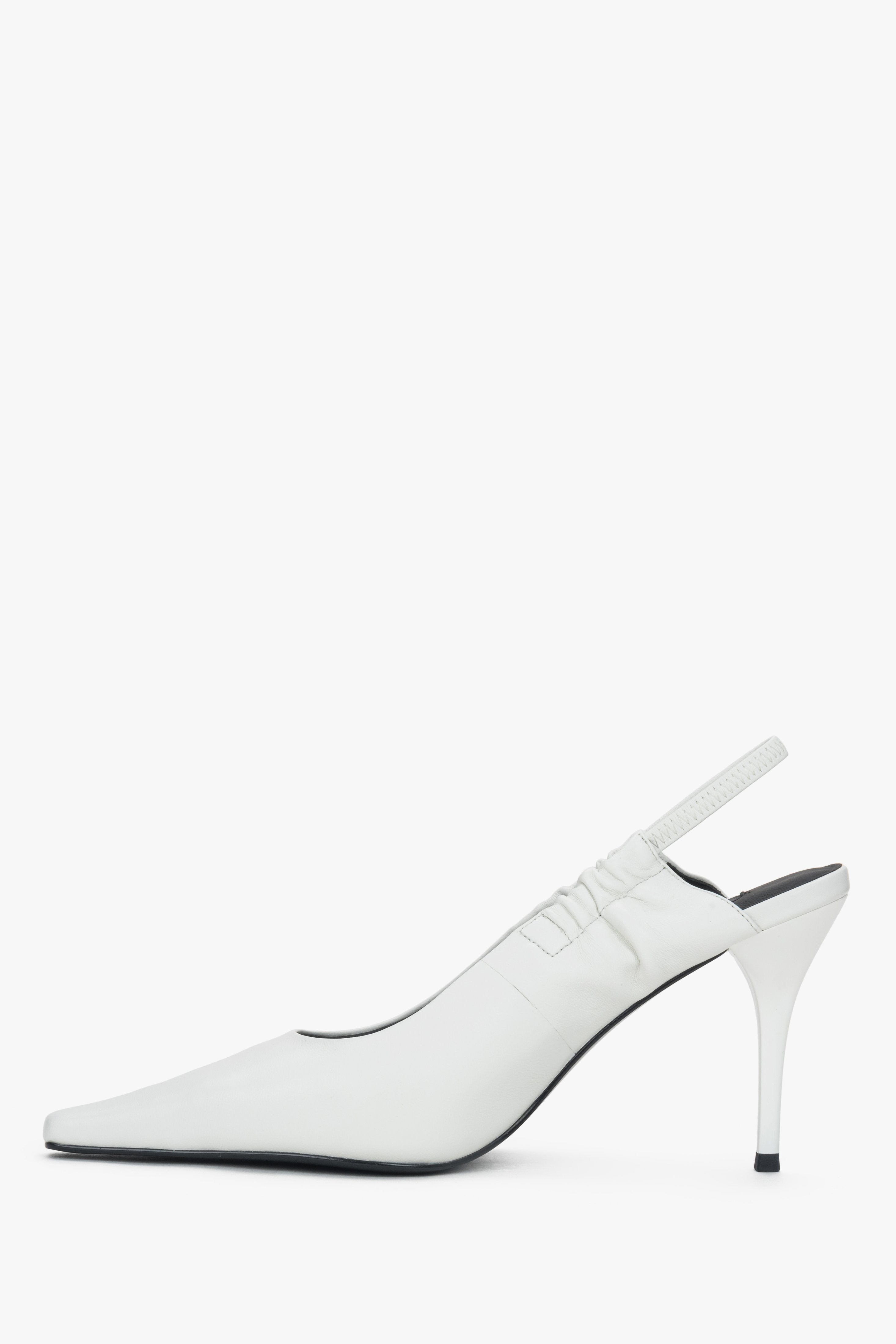 Women’s milky white slingback pumps – shoe profile view.