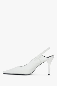 Women’s milky white slingback pumps – shoe profile view.
