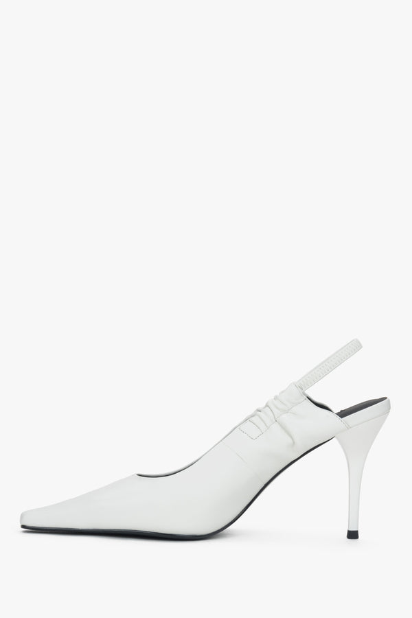 Women’s milky white slingback pumps – shoe profile view.