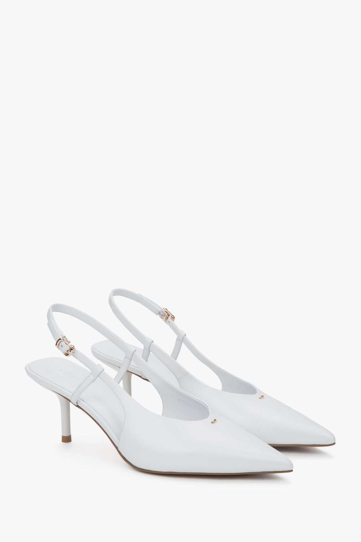 White women’s slingback pumps with an open heel and a stable stiletto heel.