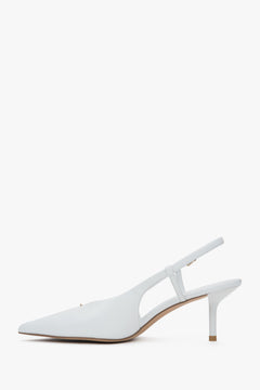 Women’s white slingback pumps with an open heel and a stable stiletto heel by Estro.