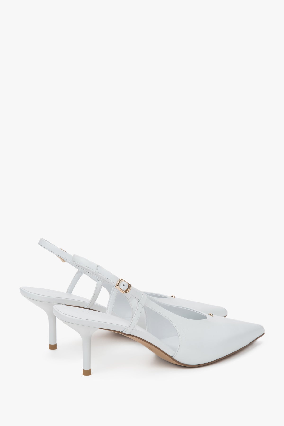 On a stable stiletto heel, white women’s slingback pumps with an open heel by Estro.