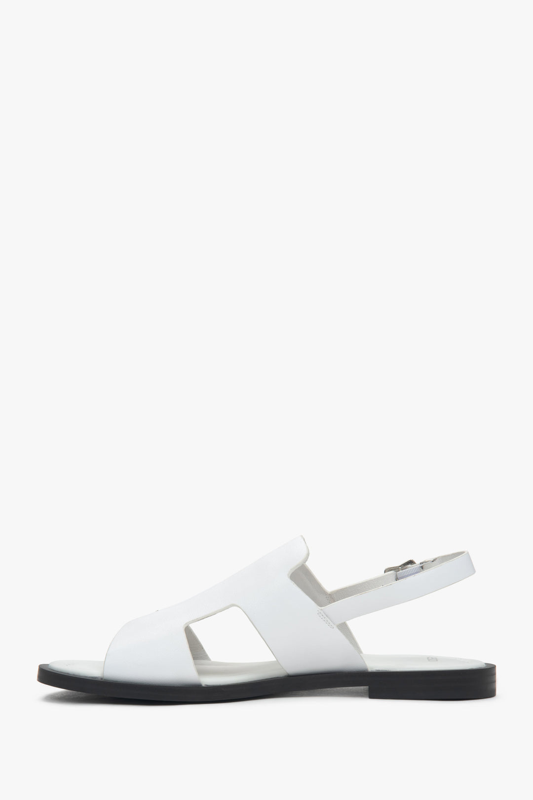 Women’s white closed-toe sandals on a flat natural leather sole by Estro.
